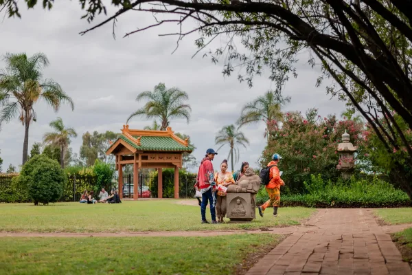 Portrait photo of family at statue