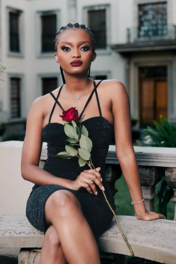 Portrait photoshoot of model holding rose